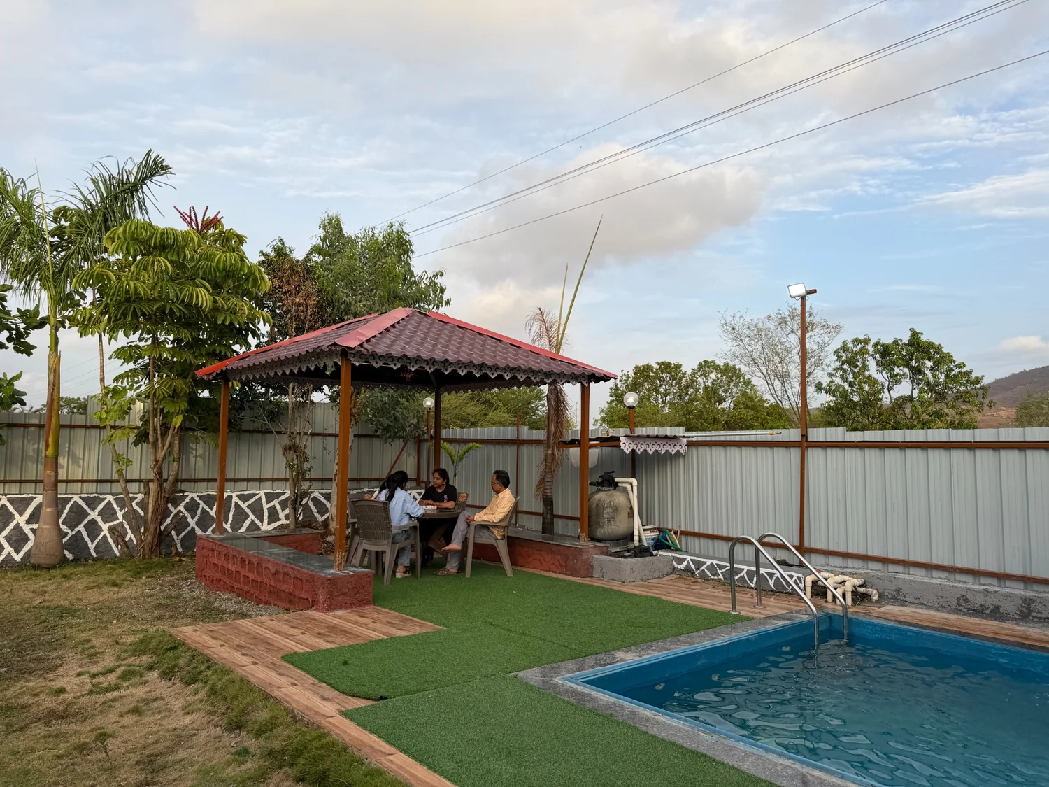 Gazebo sitting area beside the pool